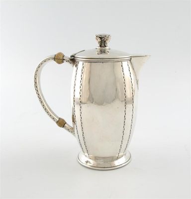 Appraisal: By Liberty and Co A silver hot water pot Birmingham