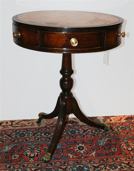 Appraisal: Regency Style Leather Top Mahogany Diminutive Drum Table Estimate -