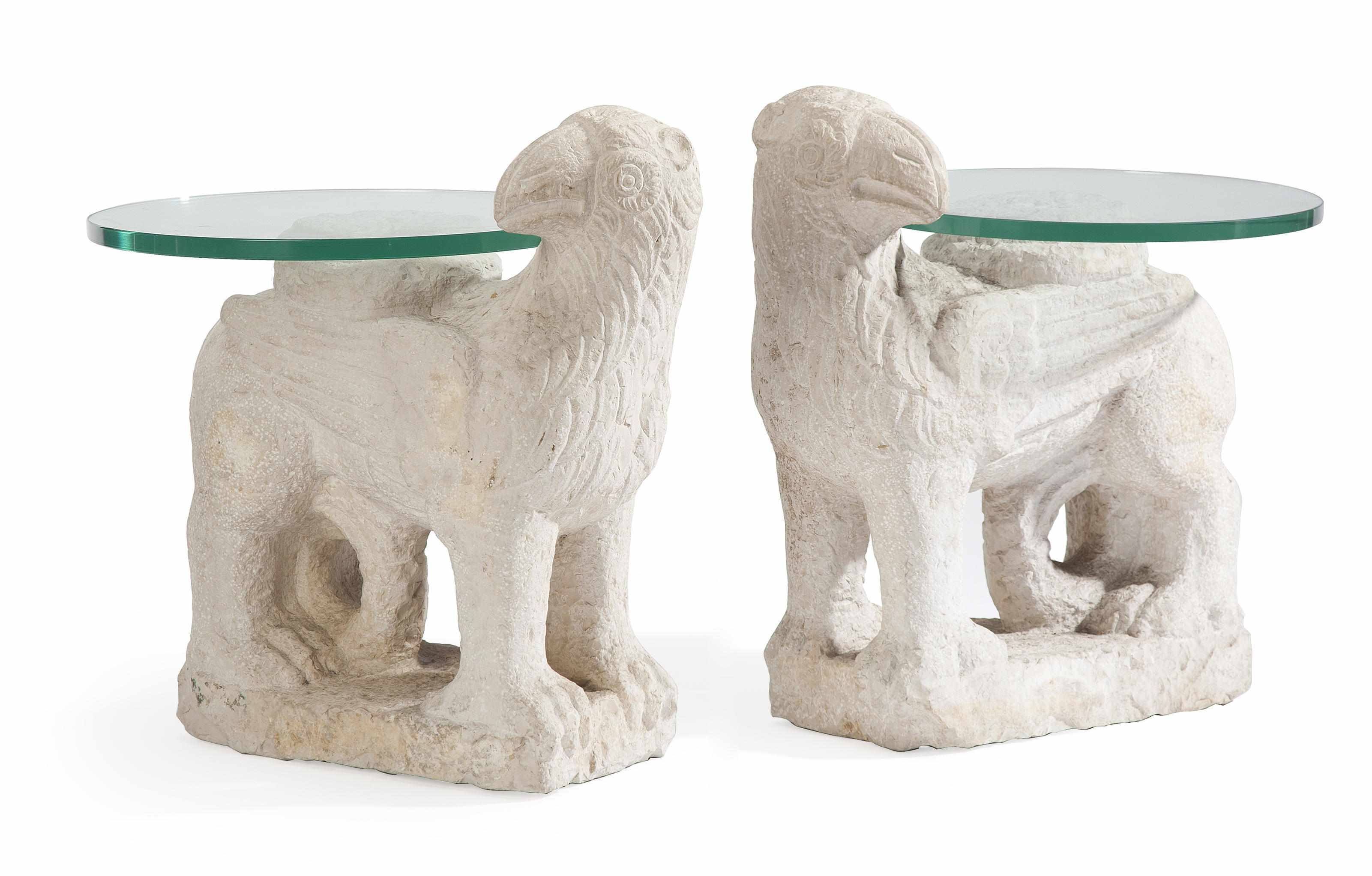 Appraisal: A pair of carved limestone models of gryphons Now with