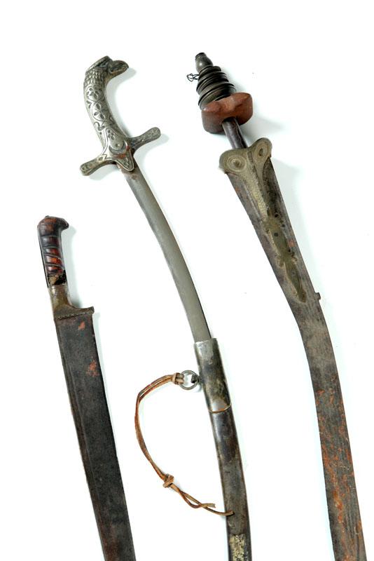 Appraisal: THREE SWORDS Twentieth century Turkish display sword with eagle pommel