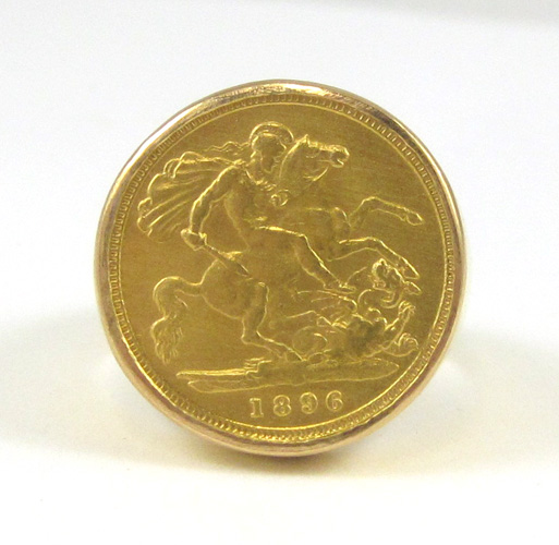 Appraisal: GOLD COIN AND EIGHTEEN KARAT GOLD RING featuring an British