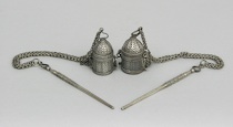 Appraisal: Two Persian Kohl Containers On Chains ca Late th Century