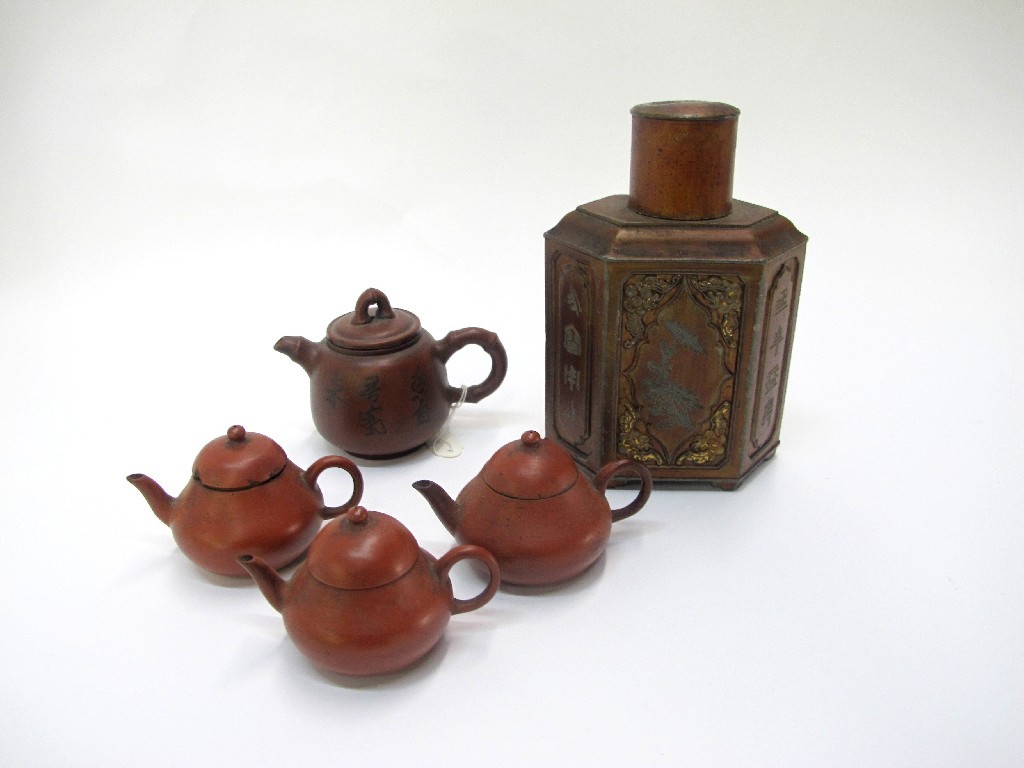 Appraisal: Chinese pewter tea caddy including four Chinese Redware miniature tea