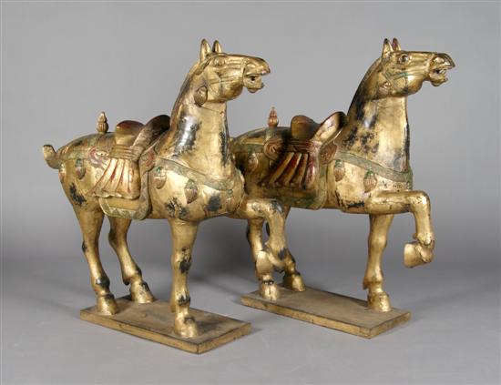 Appraisal: A Pair of Chinese Carved and Giltwood Horses Height inches