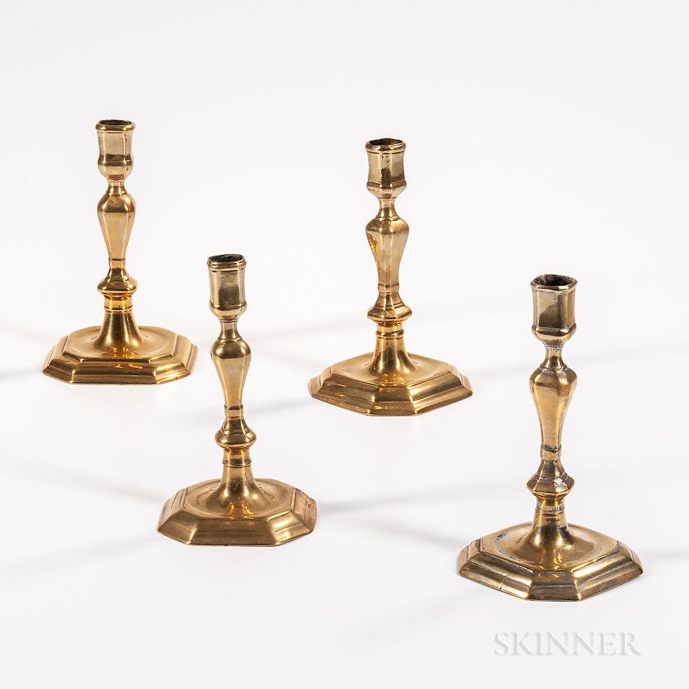 Appraisal: A Pair and Two Single Brass Candlesticks Two Pairs of