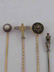 Appraisal: A mixed lot comprising stick pins including a yellow metal