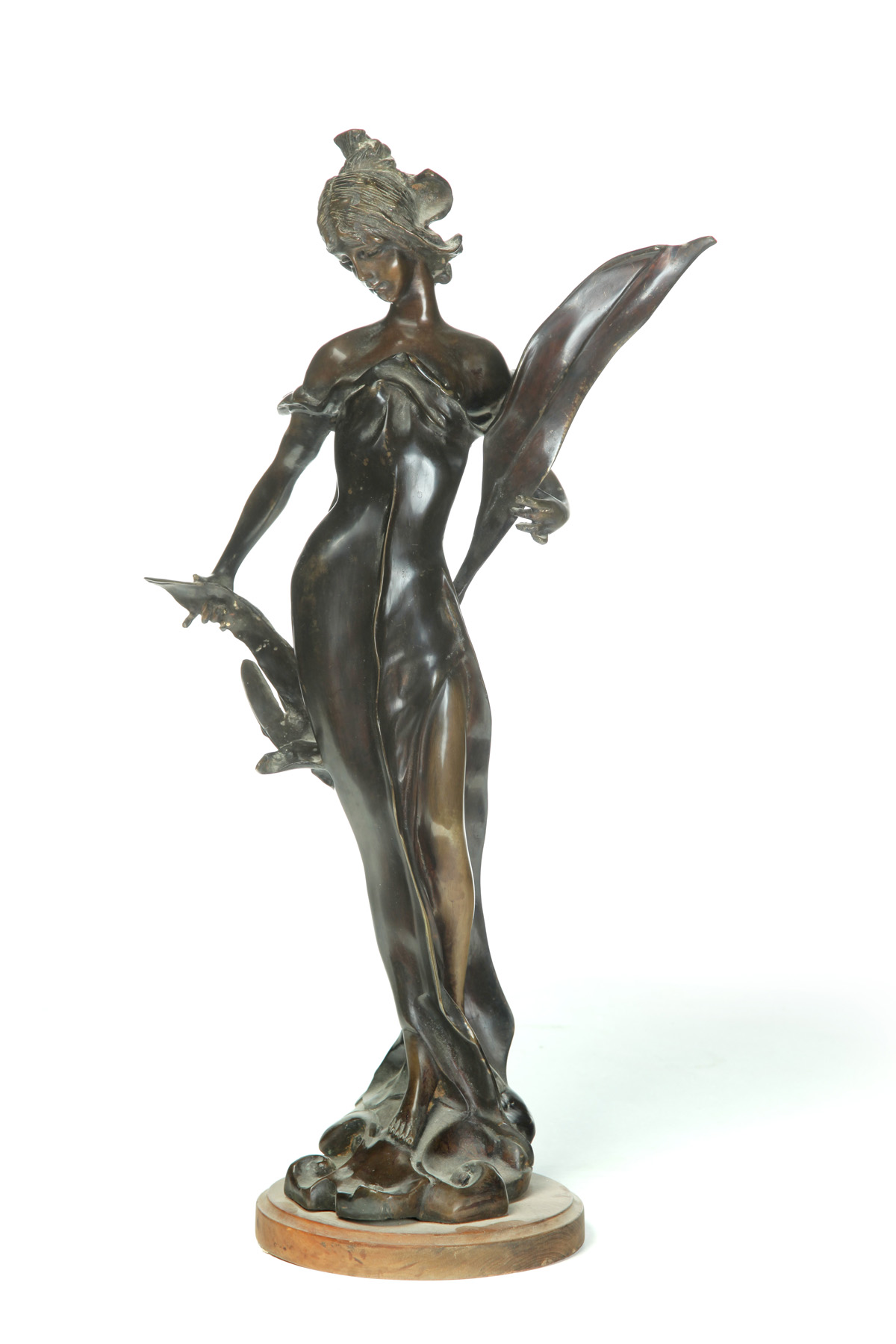 Appraisal: BRONZE WOMAN IN THE MANNER OF MOREAU Second half- th