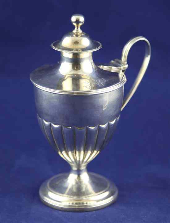 Appraisal: A George III demi fluted silver vase shaped pedestal mustard