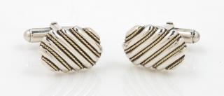 Appraisal: A Pair of Sterling Silver and Karat Yellow Gold Cufflinks