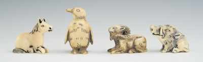 Appraisal: A Lot of Four Carved Ivory Animal Netsuke Lot includes