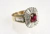 Appraisal: LADY'S RING - One K yellow and white gold contemporary