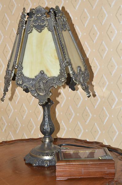 Appraisal: BRONZE FIVE PANELLED TABLE LAMP AND A GLASS TOPPED JEWELLERY