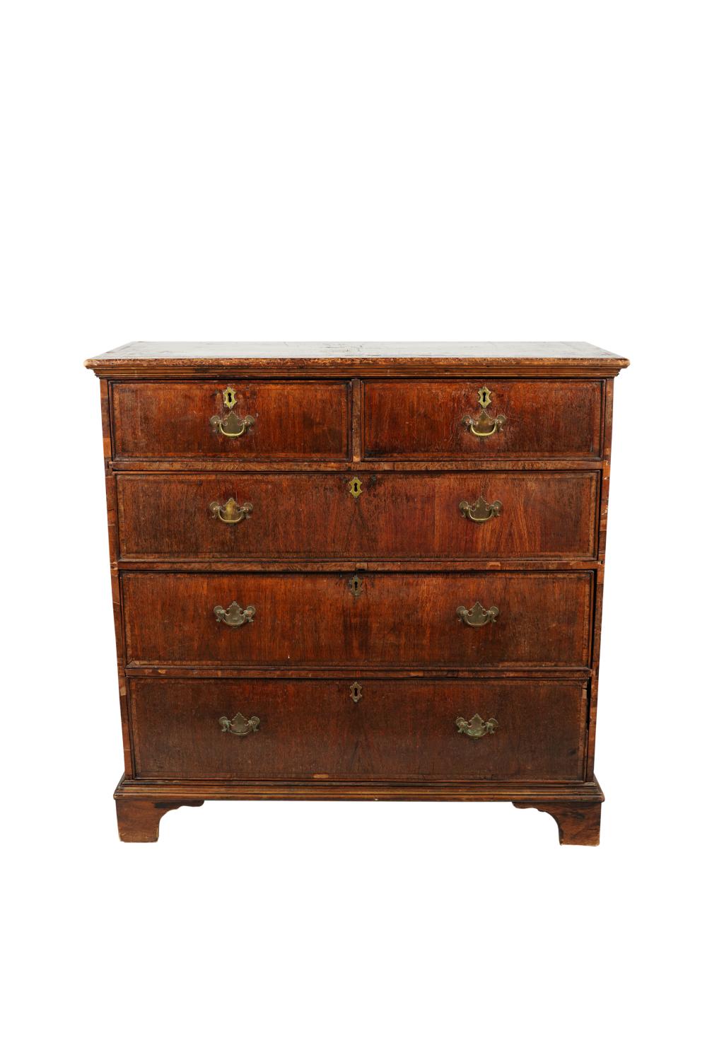 Appraisal: GEORGIAN CHEST OF DRAWERSwalnut with cross-banding having two short drawers