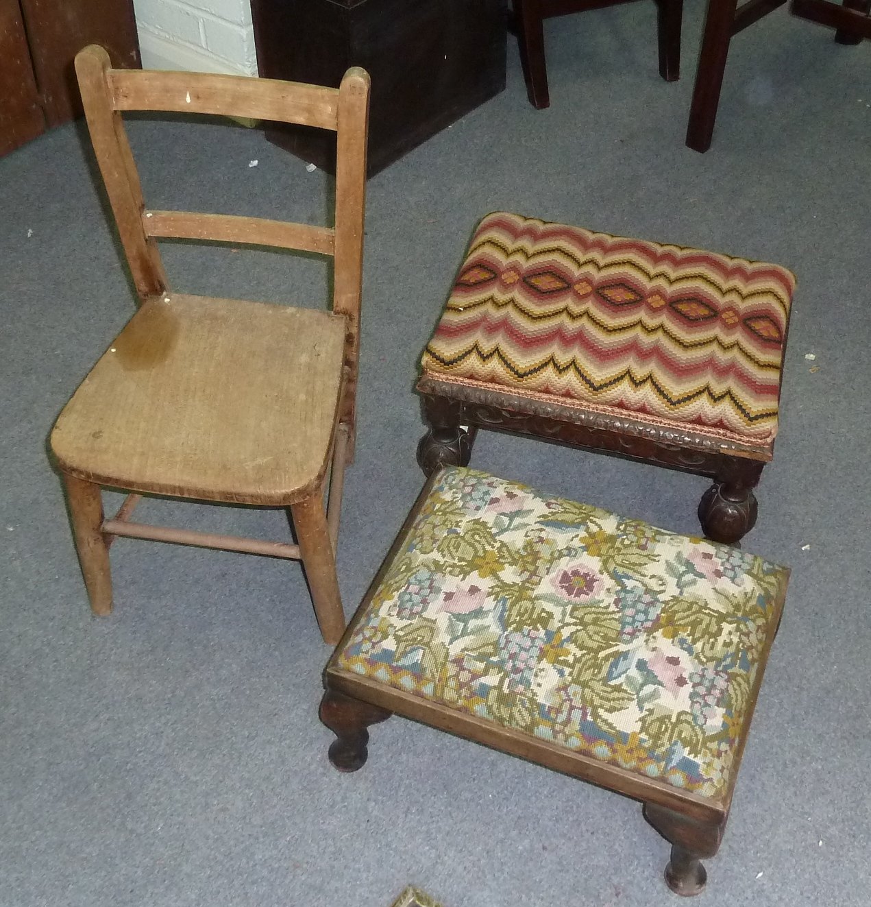 Appraisal: A carved oak framed stool with needlework seat another stool