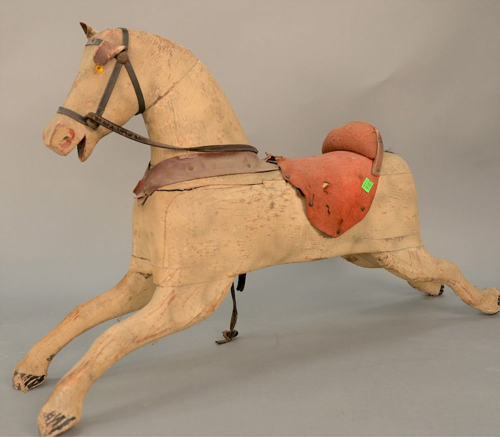 Appraisal: Early painted and carved wood childs rocking horse with leather