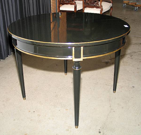 Appraisal: A Louis XVI style parcel gilt ebonized center table th