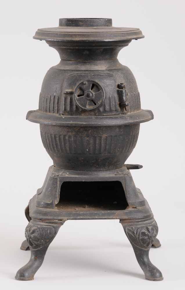 Appraisal: AMERICAN CAST-IRON MODEL OF A POT BELLY STOVE GREY IRON