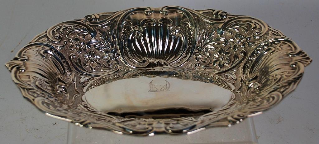 Appraisal: LATE VICTORIAN EMBOSSED SILVER DISH oval form with floral and