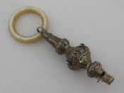 Appraisal: A late Victorian silver child's teether with whistle and m