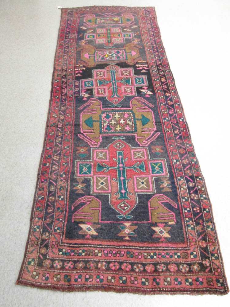 Appraisal: SEMI-ANTIQUE PERSIAN TRIBAL AREA RUG six geometric medallion design on