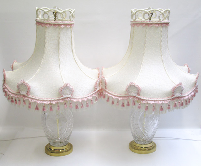 Appraisal: PAIR OF CONTEMPORARY CRYSTAL TABLE LAMPS having lace cloth shades