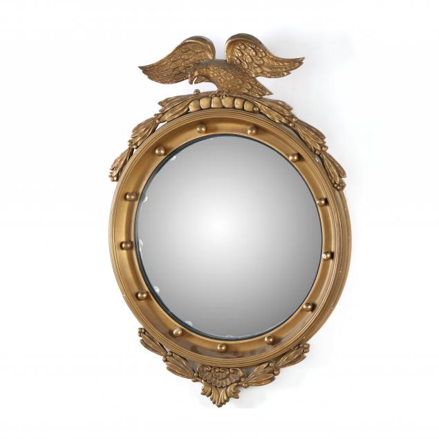 Appraisal: FEDERAL STYLE CARVED AND GILT CONVEX MIRROR Mid th century