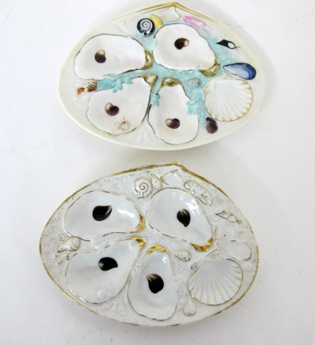 Appraisal: UNION PORCELAIN WORKS WELL OYSTER PLATES In a shell form