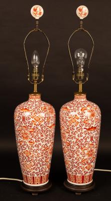 Appraisal: A pair of Oriental style vases decorated stylised designs now