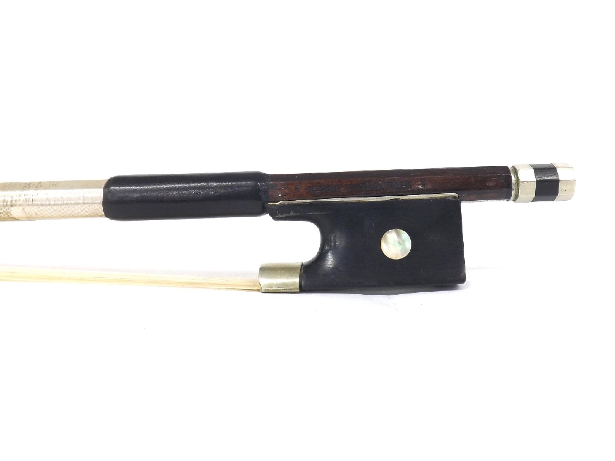 Appraisal: German nickel mounted violin bow stamped Albert Nurnberger the stick