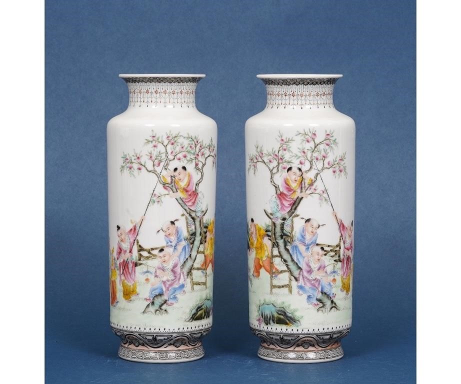 Appraisal: Pair of Chinese enamel paint decorated vases with children and