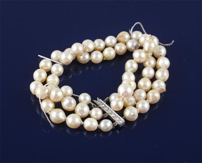 Appraisal: A three row cultured pearl bracelet The clasp set with