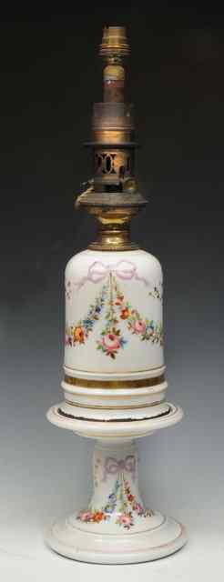 Appraisal: A FRENCH WHITE PORCELAIN OIL LAMP decorated with floral swags