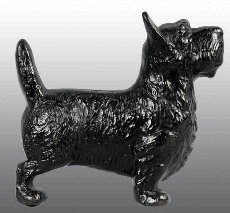 Appraisal: Cast Iron Standing Scottie Wedge Doorstop Description Made by Spencer