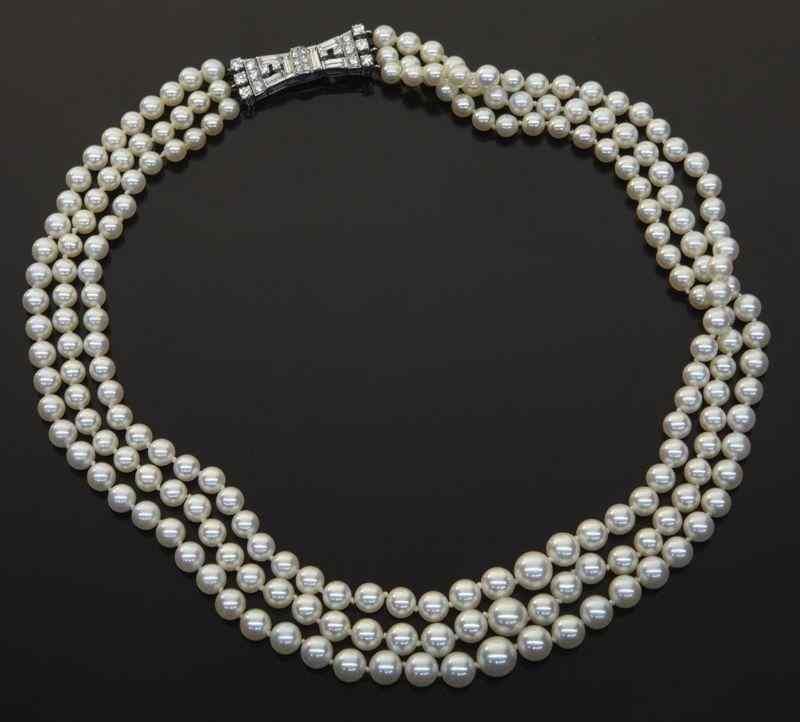 Appraisal: Retro K gold diamond and pearl necklace the triple strands