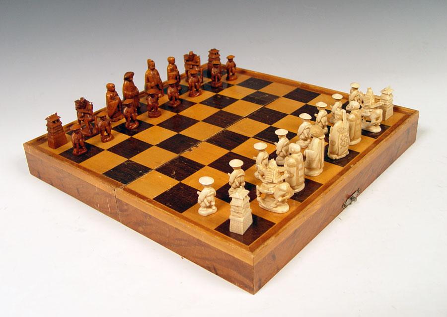 Appraisal: CARVED IVORY CHESS SET Complete with all pieces Each piece