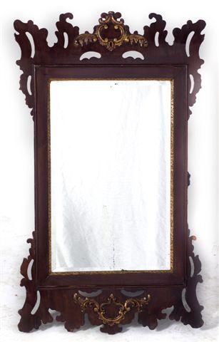 Appraisal: GEORGE III MAHOGANY FRETWORK MIRROR the crest centred by gilt