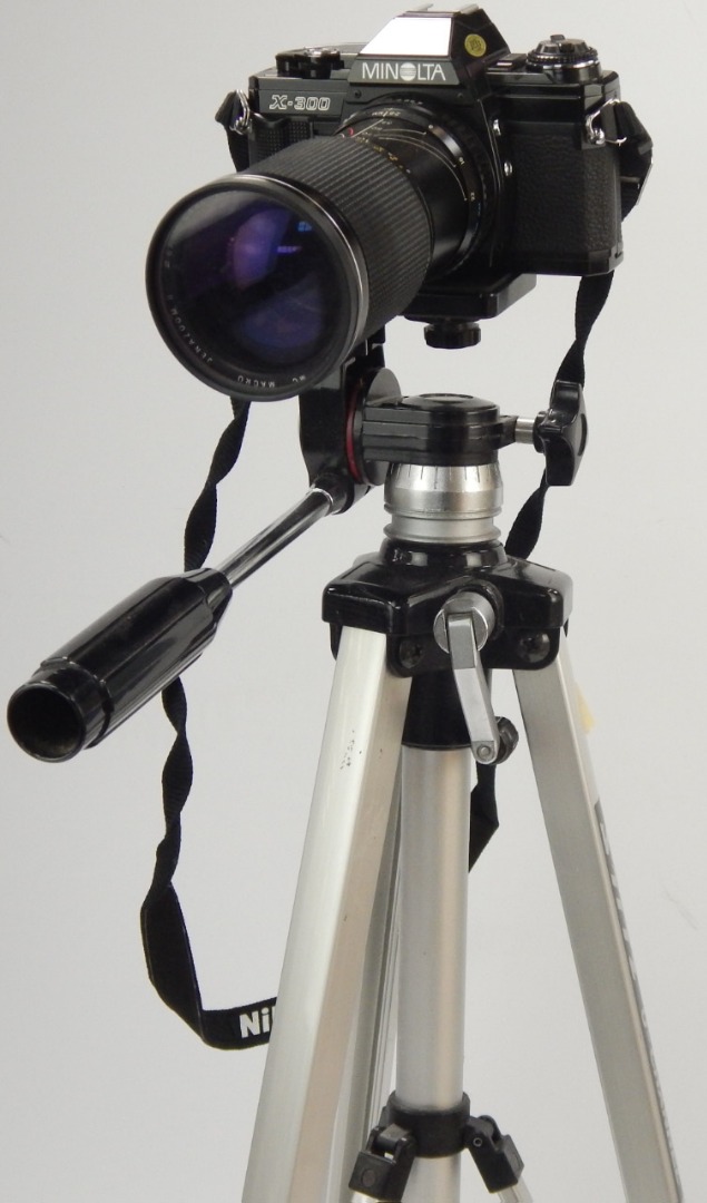 Appraisal: Photography comprising a Minolta X SLR camera on Stitz tripod