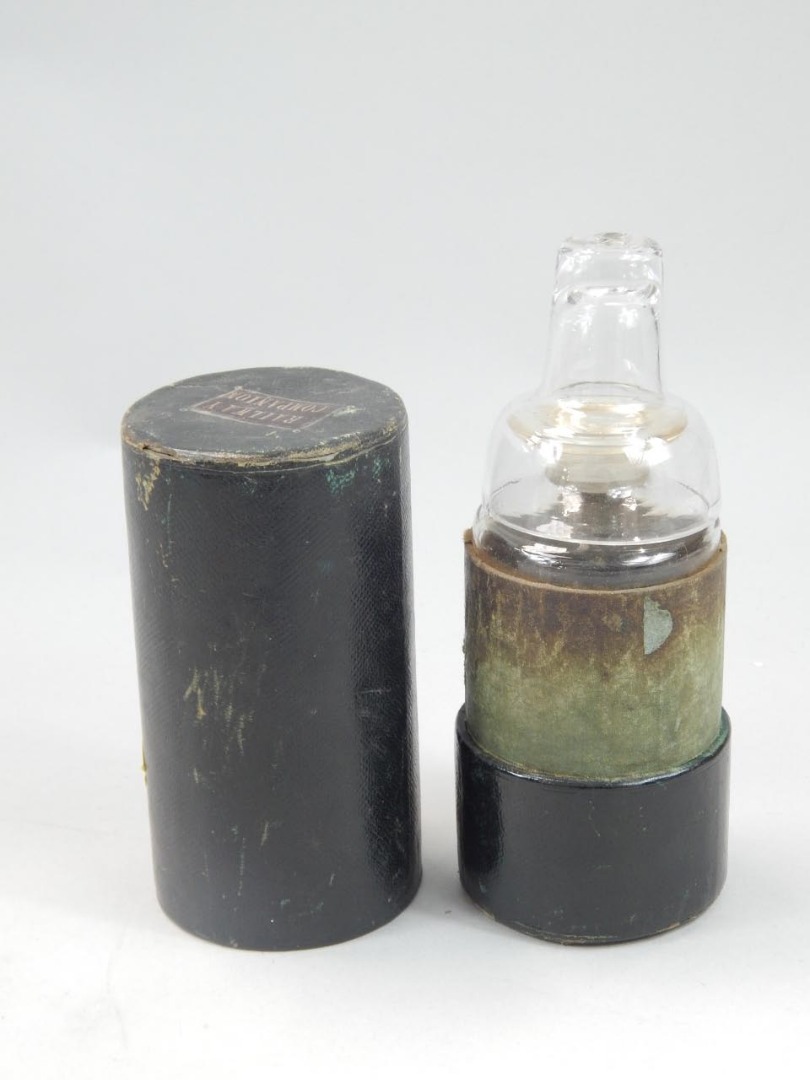 Appraisal: A thC railway related glass spirit flask and cup the