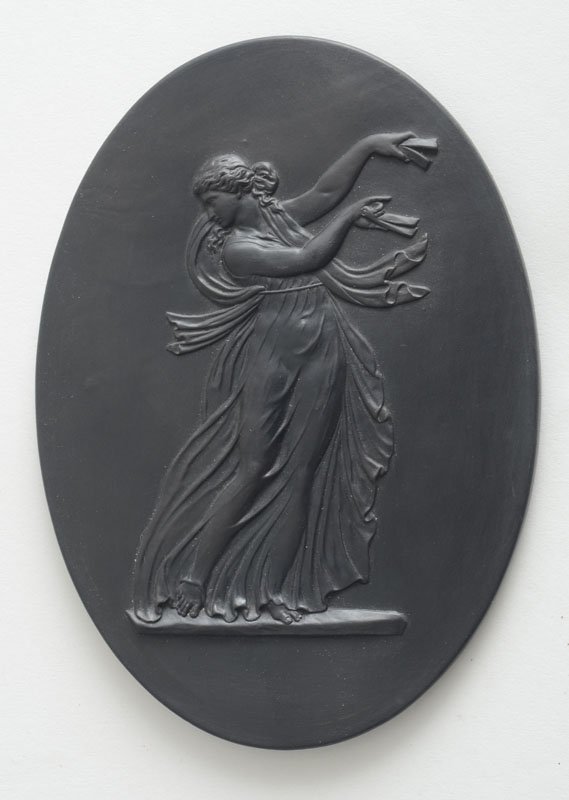 Appraisal: WEDGWOOD BLACK BASALTES OVAL PLAQUE Impressed 'Wedgwood' relief modeled with