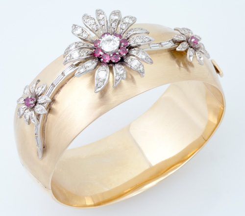 Appraisal: Diamond and ruby blossom bangle bracelet in k wg and