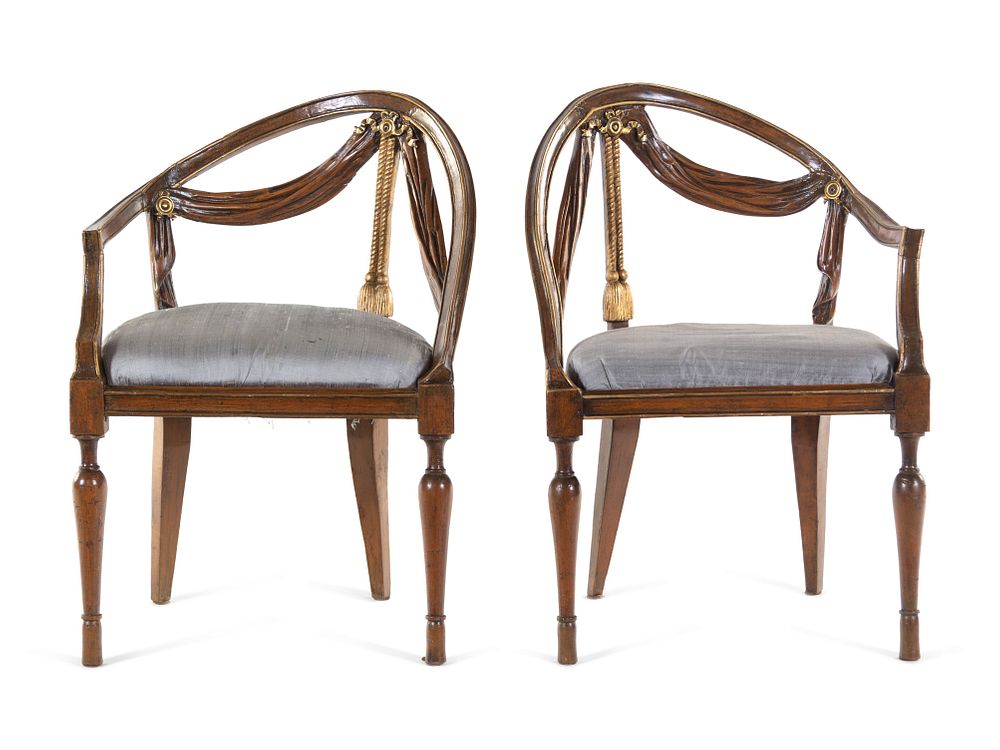 Appraisal: A Pair of Italian Parcel Gilt Walnut Armchairs A Pair