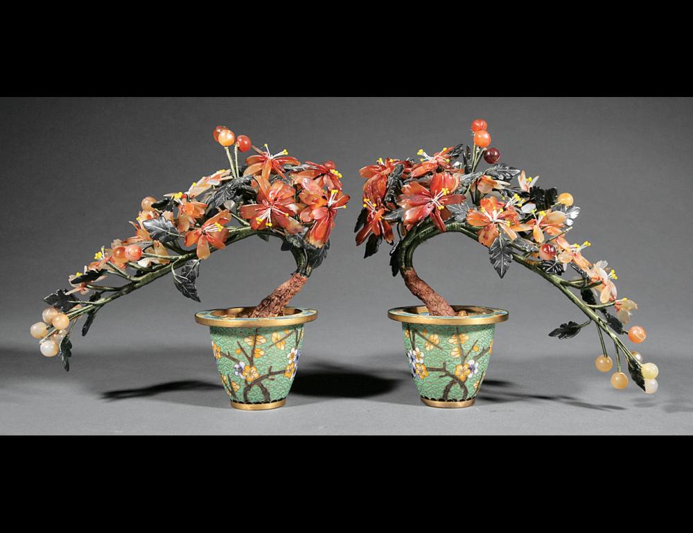 Appraisal: Pair of Chinese Carved Hardstone Miniature Trees multi-colored foliage and