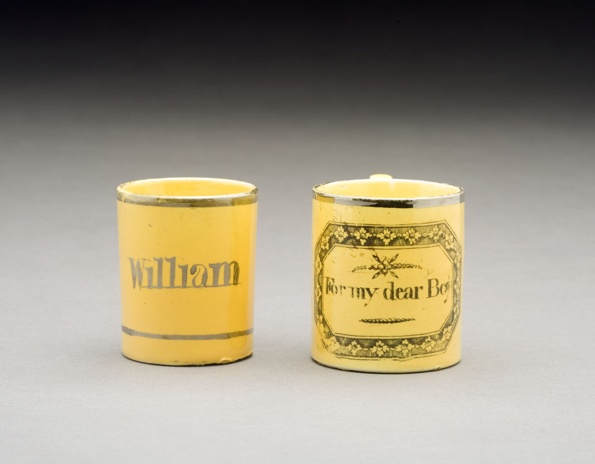 Appraisal: TWO ENGLISH YELLOW-GLAZED SILVER LUSTRE AND TRANSFER-PRINTED CHILDREN'S MUGS CIRCA