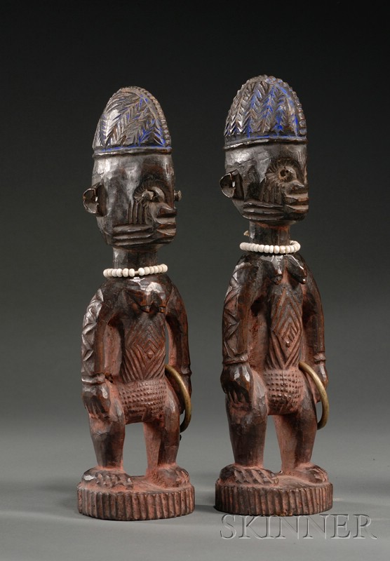 Appraisal: Two African Carved Wood Ibeji Dolls Yoruba female twin figures