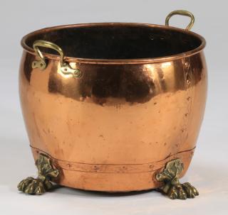 Appraisal: Copper jardiniere with paw feet w Riveted copper jardiniere having