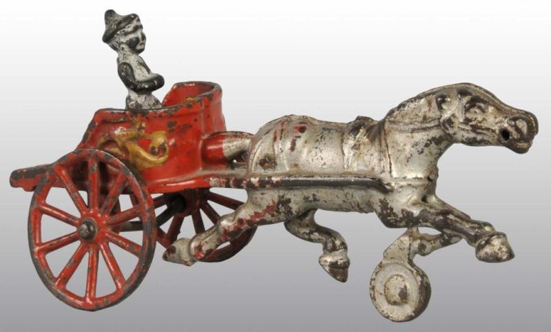 Appraisal: Cast Iron Kenton Chariot Toy with Clown Figure Description Rear