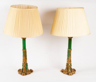 Appraisal: A pair of gilt metal mounted lamp bases cm high