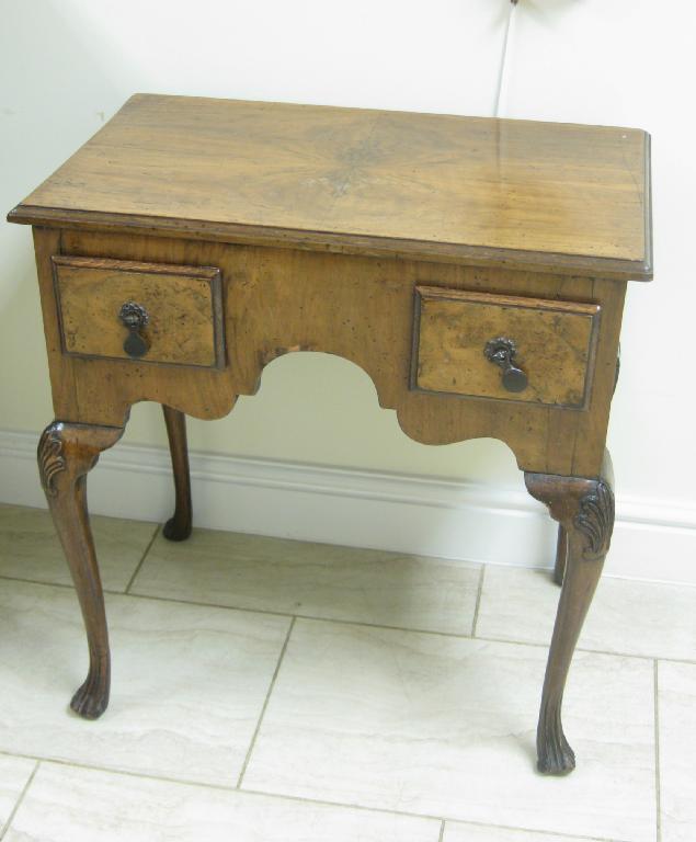 Appraisal: A Queen Anne style walnut small Lowboy fitted two drawers