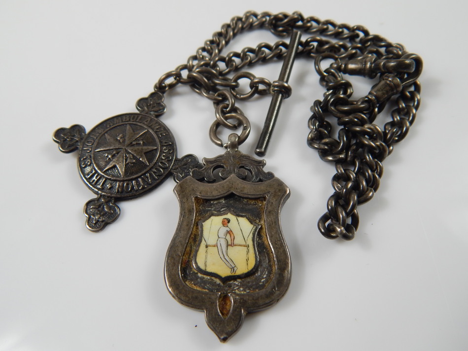 Appraisal: A silver watch chain and two seal fobs one for