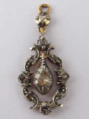 Appraisal: A gold and silver rose cut diamond pendant the principal